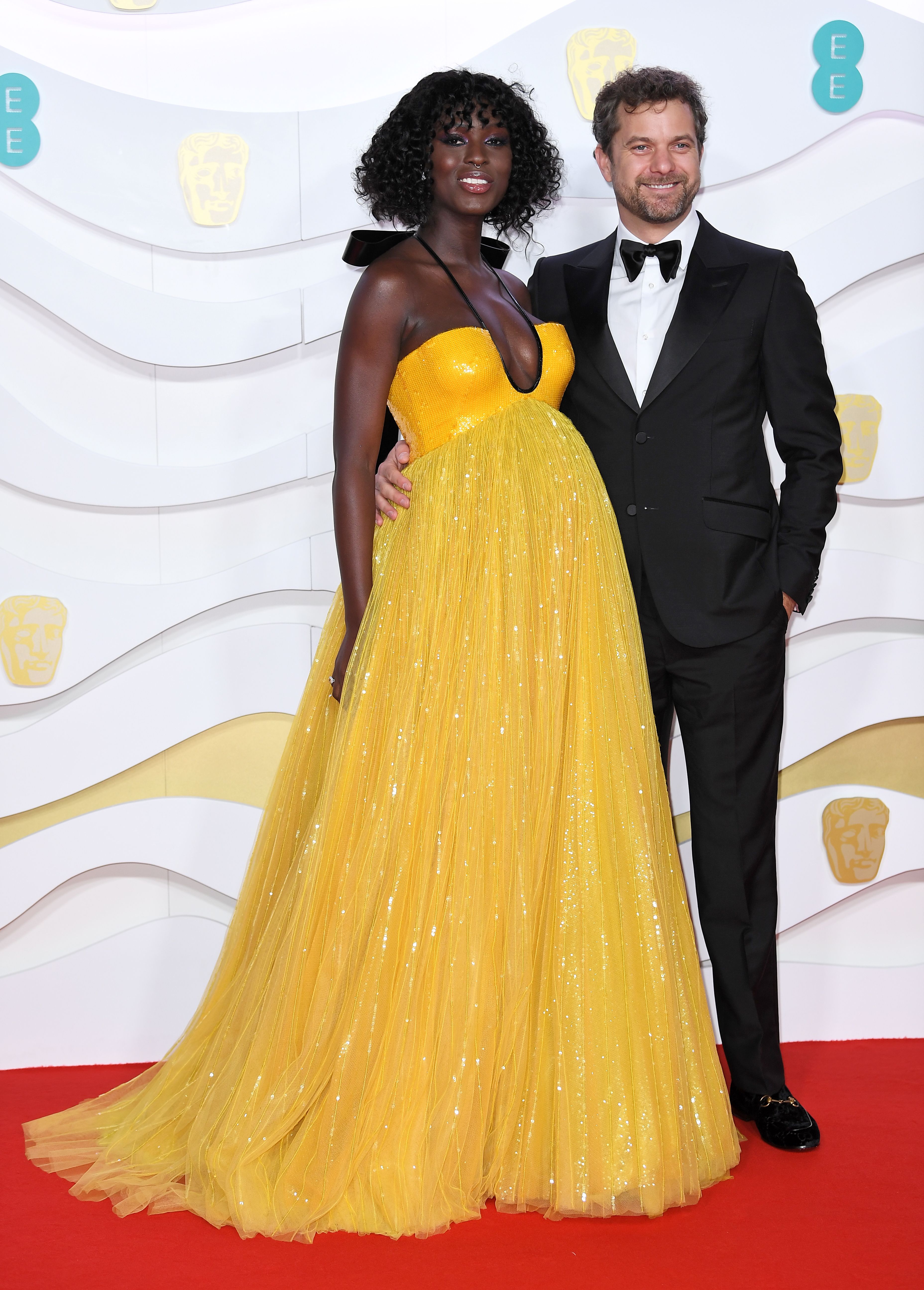 Jodie Turner Smith Shows Baby Bump in Yellow Gown With Husband Joshua Jackson