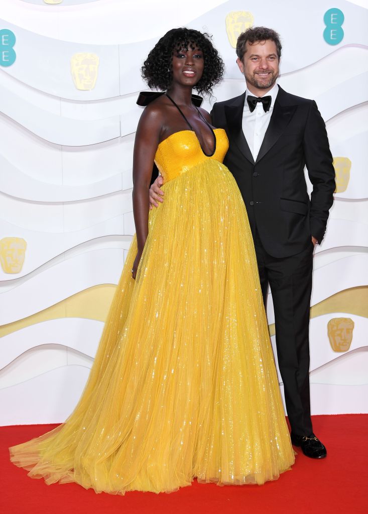 Jodie Turner Smith Shows Baby Bump in Yellow Gown With Husband Joshua Jackson