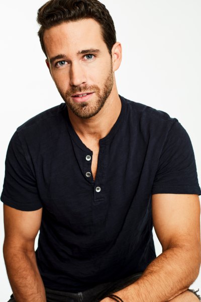 Bachelor Listen to Your Heart Contestant Trevor Holmes in Blue Tshirt