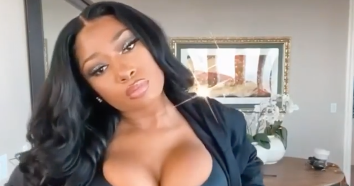 Megan Thee Stallion spills out of skimpy bronze bikini as she listens to  Girls In The Hood | Daily Mail Online