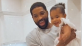 Tristan Thompson Laughs and Holds Daughter True in White Dress on Birthday