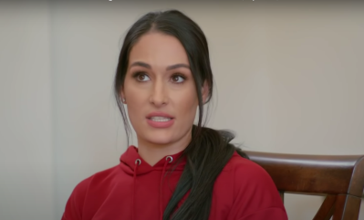 Nikki Bella Looks Puzzled on Total Bellas While Wearing a Red Hoodie and a Ponytail During Conversation With Mom