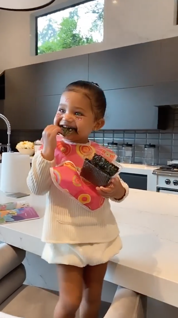 Stormi Webster Dances and Snacks on Seaweed