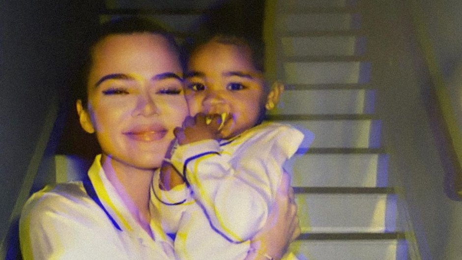 Khloe Kardashian Snuggles Daughter True Thompson in Matching White Silk Pajamas