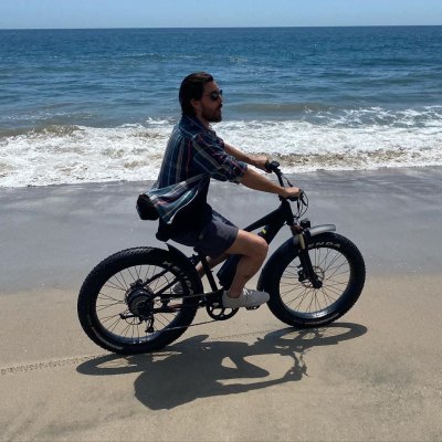 Scott Disick Rides Electric Bike on the Beach