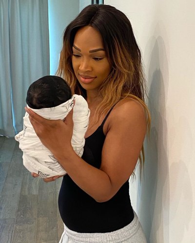 Malika Haqq Cradles Baby Ace