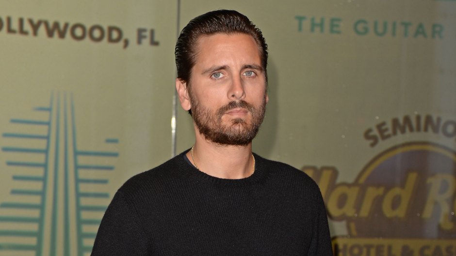 Scott Disick Wears Black Sweater and Jeans