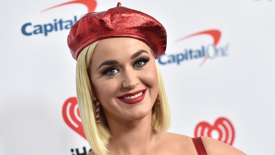 Katy Perry Smiles in Red Beret and Lipstick