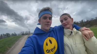 Justin Bieber Wears Blue Drew Hoodie and Bandana Holds Hands With Wife Hailey Baldwin While Walking Outside