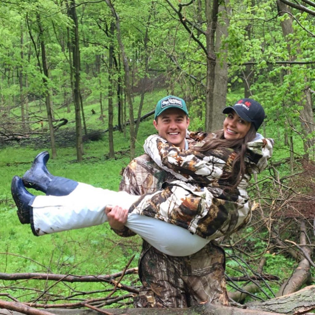 Bachelor Peter Weber Holds Girlfriend Kelley Flanagan Wearing Camo in the Woods