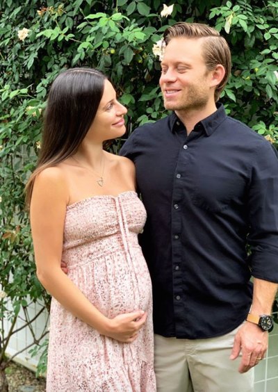 Lea Michele pregnant holding baby bump, preparing for nursery