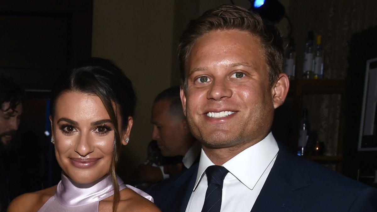 Lea Michele Smiles in Pink Silk Dress With Husband Zandy Reich in Blue Suit