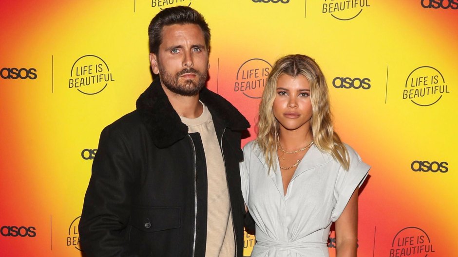 Scott Disick Wears Jeans and Jacket With Sofia Richie in Grey Jumpsuit
