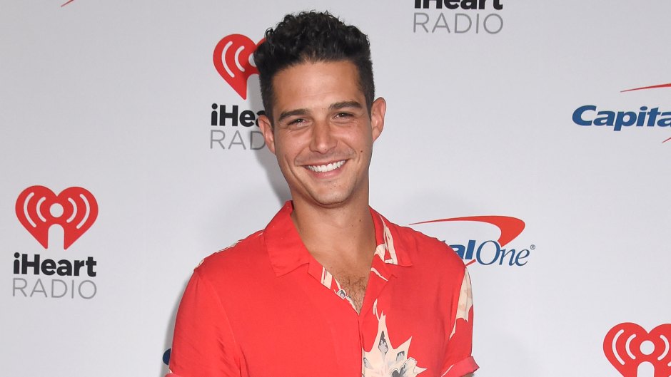 Bachelor in Paradise Bartender Wells Adams Wears Red Patterned Shirt and Black Pant