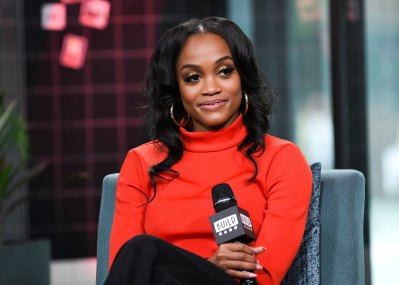 Rachel Lindsay Wears Red Turtleneck Gold Hoop Earrings At Build Series