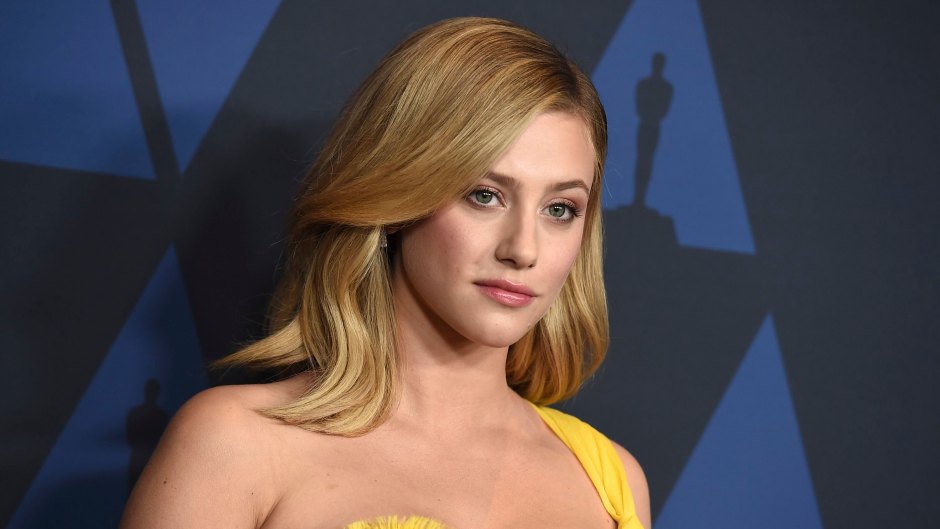 Riverdale Actress Lili Reinhart Looks Serious in Yellow One Shoulder Dress