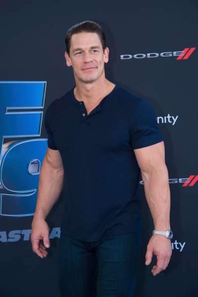 John Cena Smiles in Blue Shirt and Jeans