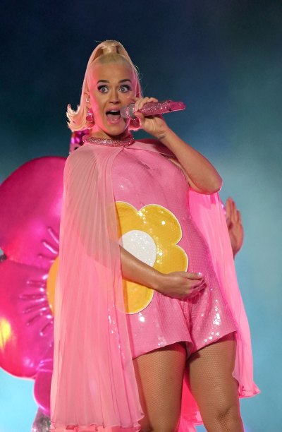 Pregnant Katy Perry Cradles Baby Bump in Pink Flowered Romper