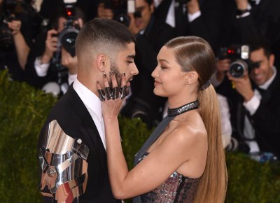Gigi Hadid Holds Boyfriend Zayn Maliks Face at Met Gala