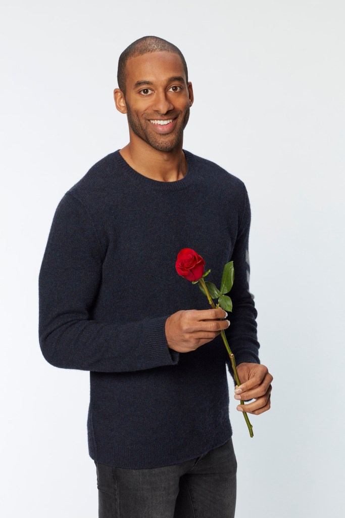 Bachelor Matt James Wears Sweater and Holds Rose