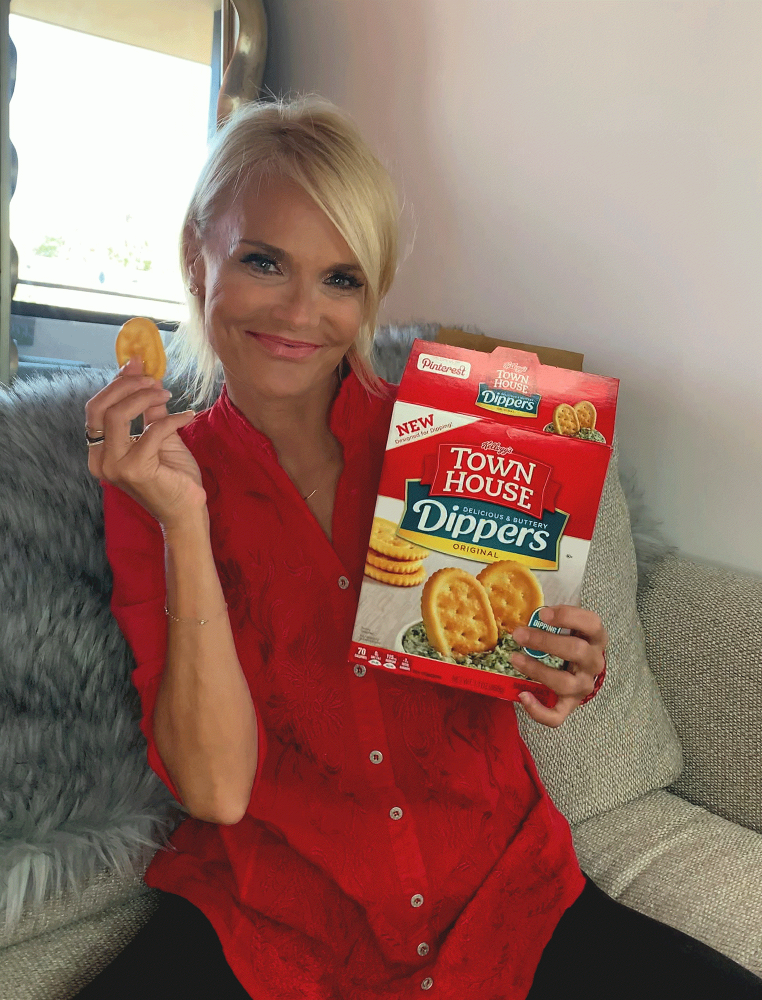 Kristin-Chenoweth-gets-cozy-couch-with-Town-House-crackers-her-Cheno-Worth-It-dip