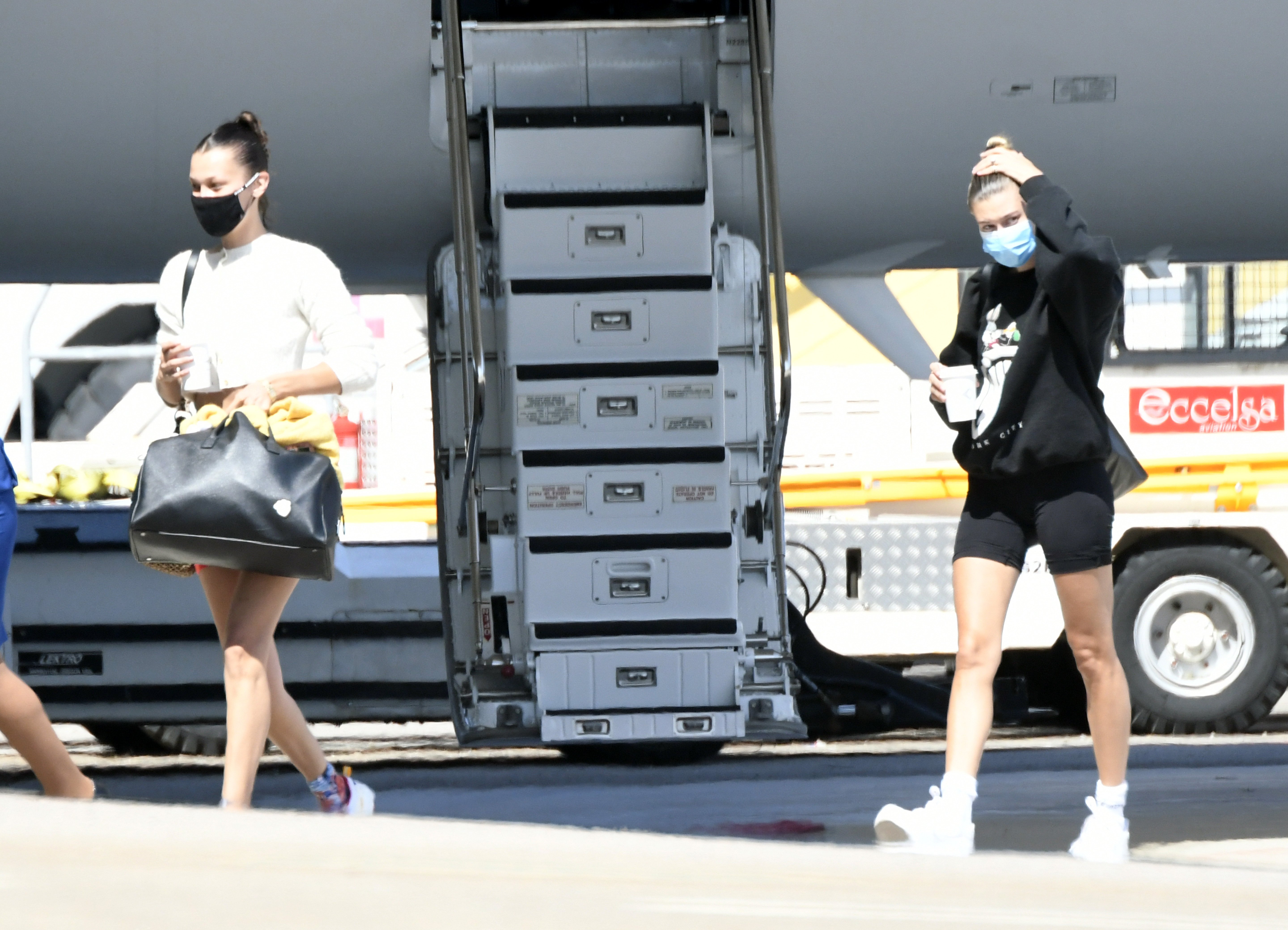 Hailey Baldwin Bieber and Bella Hadid Step Off Private Jet in Sardinia