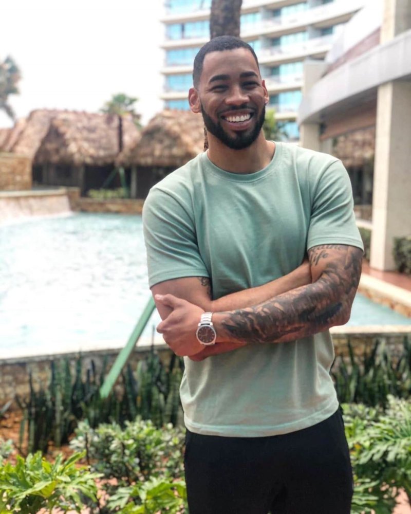 Bachelorette Contestant Mike Johnson Smiles in Green Tshirt
