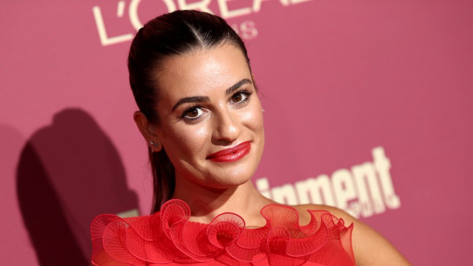 Lea Michele Red Dress With Ruffled Neckline and Ponytail