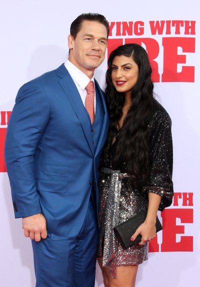 John Cena and Shay Shariatzadeh Cuddle Up on Playing With Fire Red Carpet