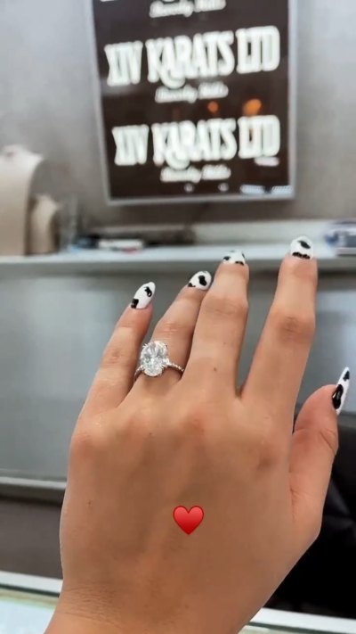Addison Rae and Bryce Hall Spark Engagement Rumors After She Flaunts a Ring on *That* Finger