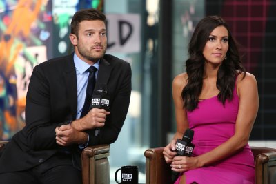 Bachelorette Becca Kufrin Looks Serious in Pink Dress With Fiance Garrett Yrigoyen