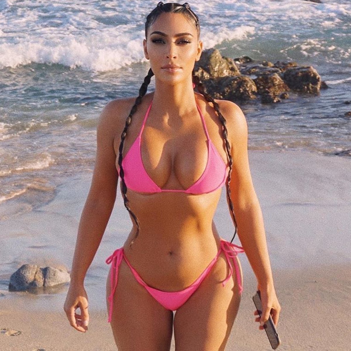 Kim Kardashian Hit the Tennis Court in a Hot Pink Chanel Bikini