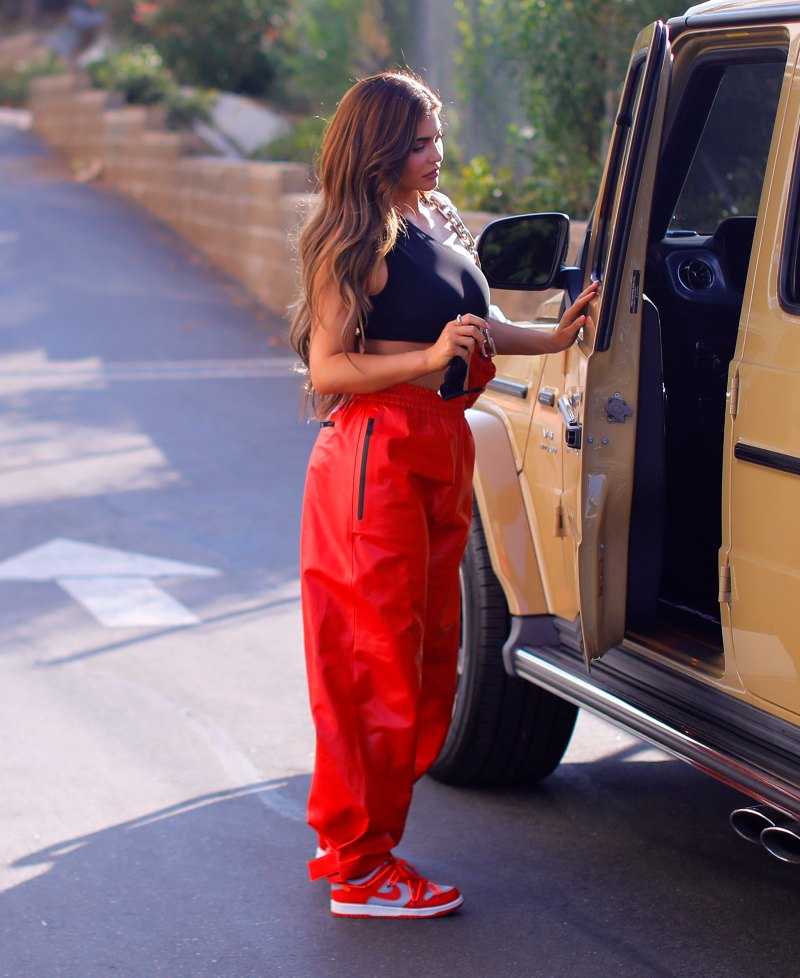 Kylie Jenner Shows Abs in Red Pants and Black Crop Top 4