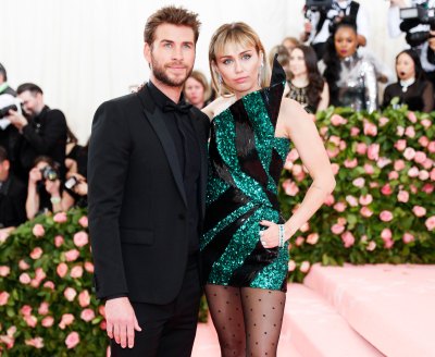 Miley Cyrus Wears Green and Black Dress With Then Husband Liam Hemsworth at the 2019 Met Gala