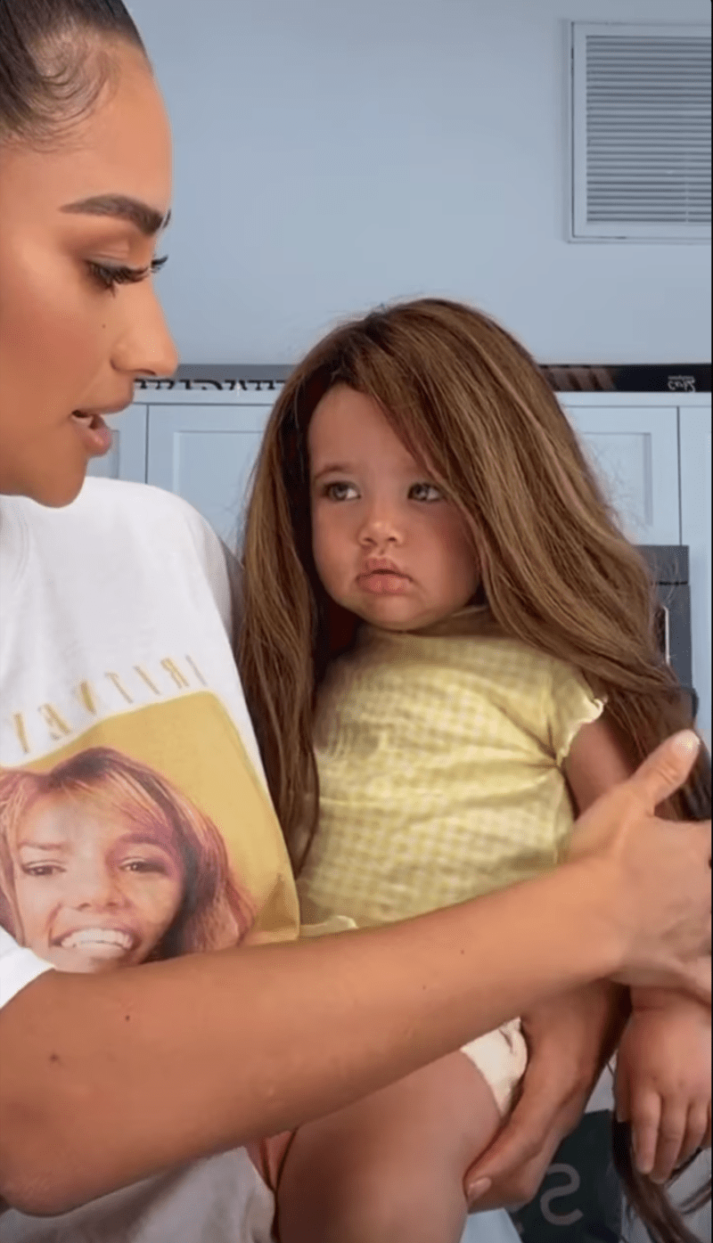 Shay Mitchell Puts Wig on Baby Atlas