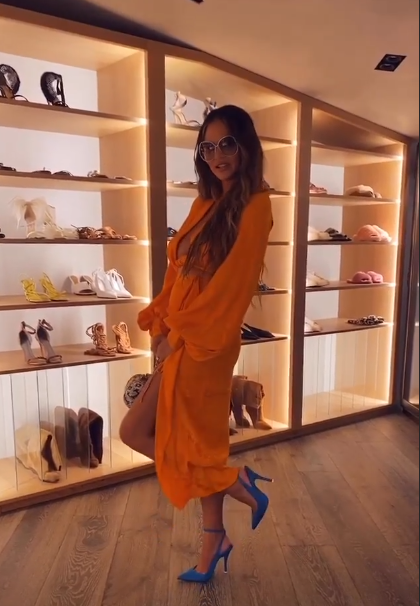 chrissy-teigen-bump-orange-dress
