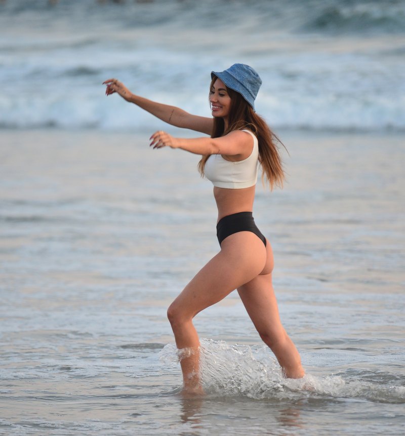 Francesca Farago enjoys bikini fun at the beach with friends