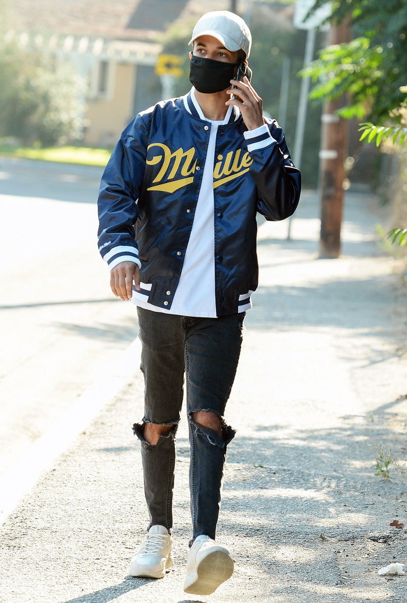 Jordan Fisher steps out for some fresh air in a bomber from Miller Lite and Mitchell and Ness collection