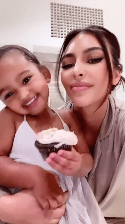 Kim Kardashian Snuggles Up With Saint, Chicago and Psalm While Munching On Cupcakes