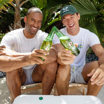 Matt James and Tyler Cameron cheersing with Heineken