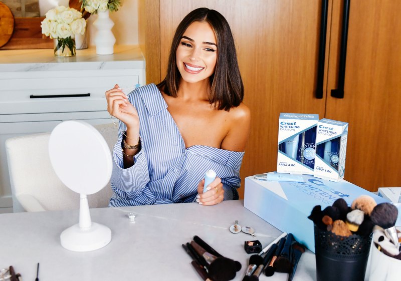 Olivia Culpo with Crest Whitening Emulsions leave-on teeth whitening treatment