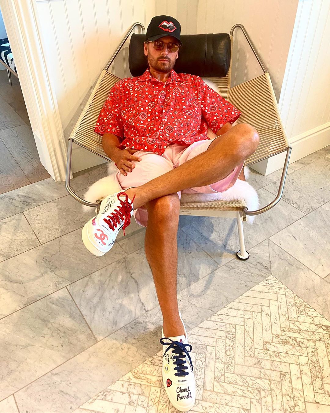 Scott Disick Poses in Chanel x Pharrell Sneakers: See Photo and