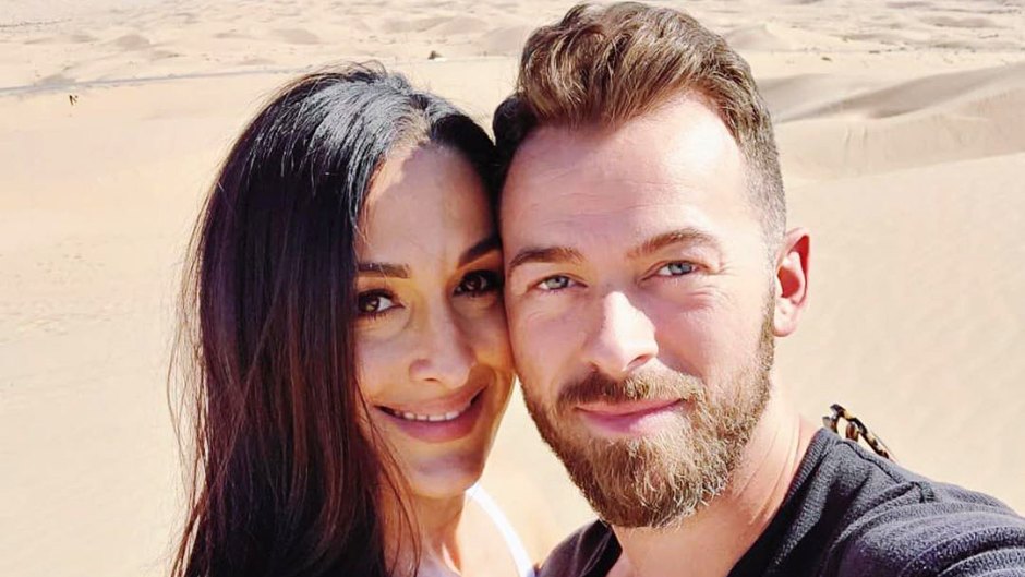 Proud Parents Nikki Bella and Artem Chigvintsev Pack on the PDA While He Cooks Dinner