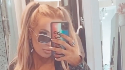 Tana Mongeau Rocks a Sexy All-Black Outfit With '90s-Inspired Hair and 'Bible' Earrings