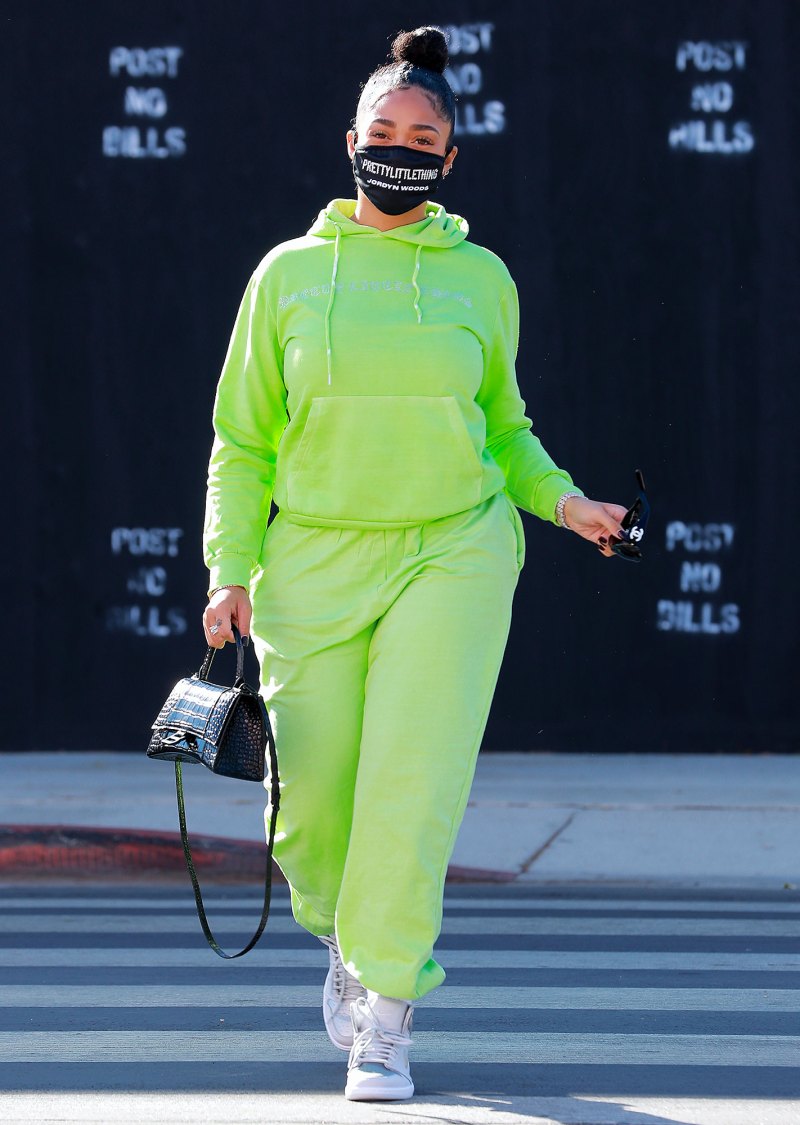 Jordyn Woods Wearing A Neon Green PrettyLittleThing Sweatsuit