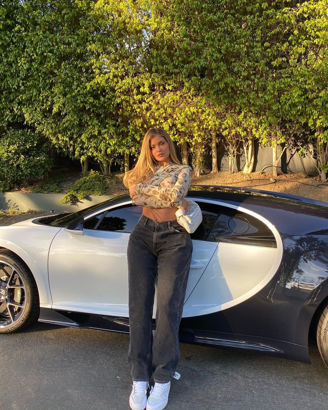 Big Flex! Kylie Jenner Flaunts Her Killer Curves While Posing With Her Bentley