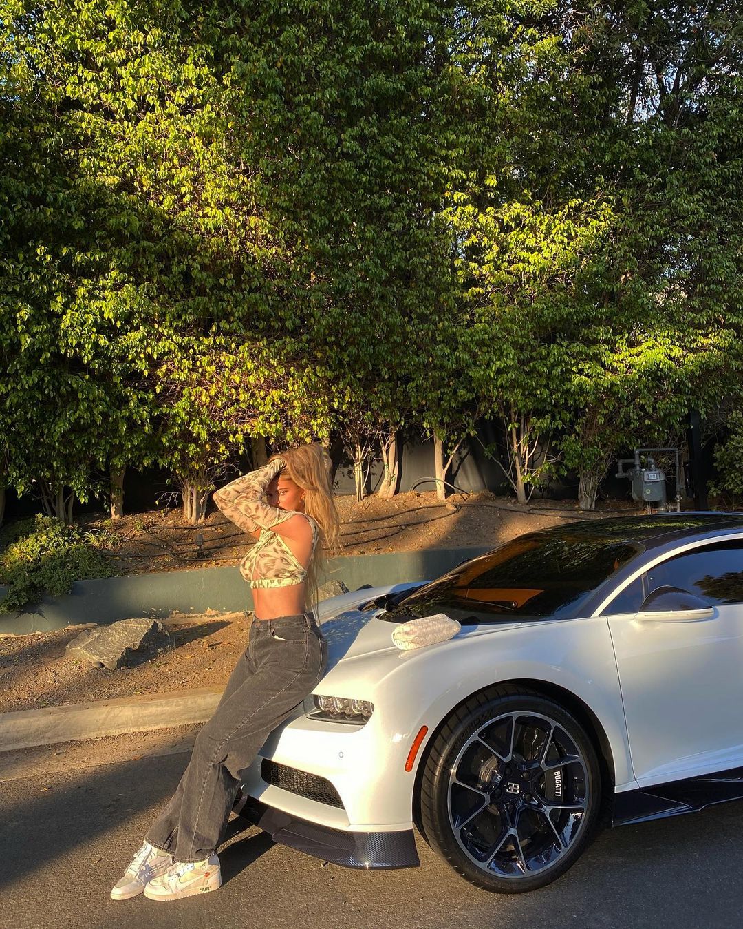 Big Flex! Kylie Jenner Flaunts Her Killer Curves While Posing With Her Bentley