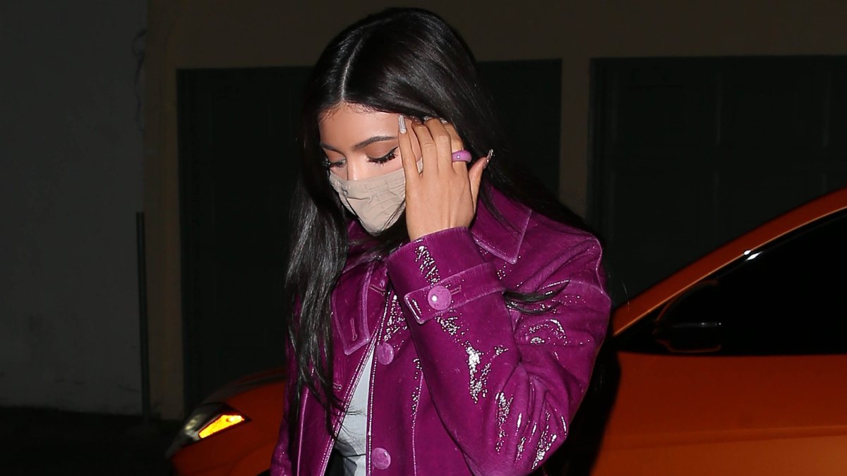 Kylie Jenner Steps Out to Dinner in Los Angeles Wearing a (Pricey!) Purple Trench Coat