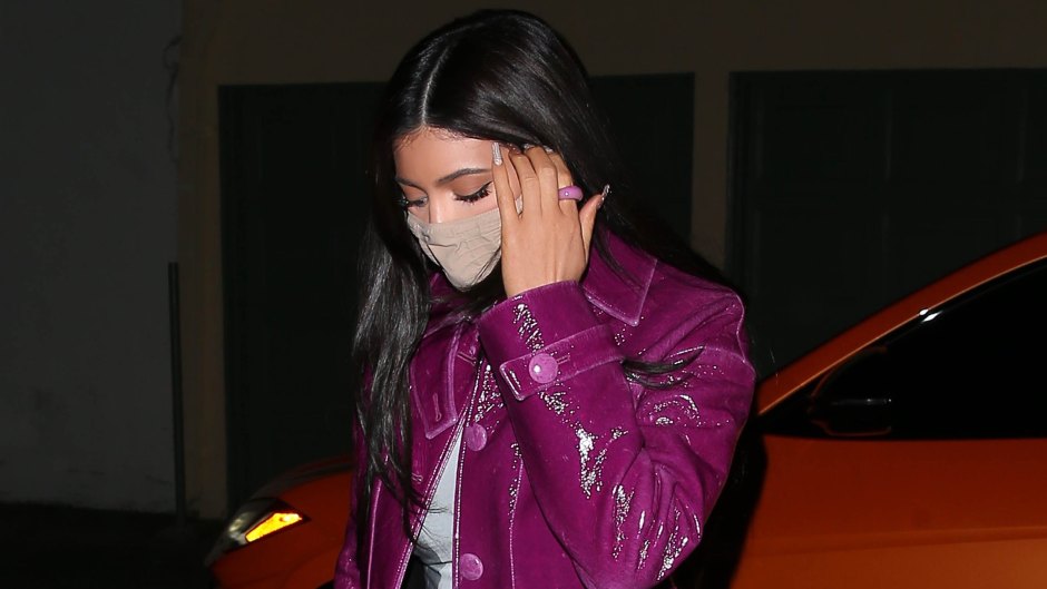 Kylie Jenner Steps Out to Dinner in Los Angeles Wearing a (Pricey!) Purple Trench Coat