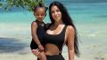 Kim Kardashian Twinning With Daughter Chicago in Black Swimsuits